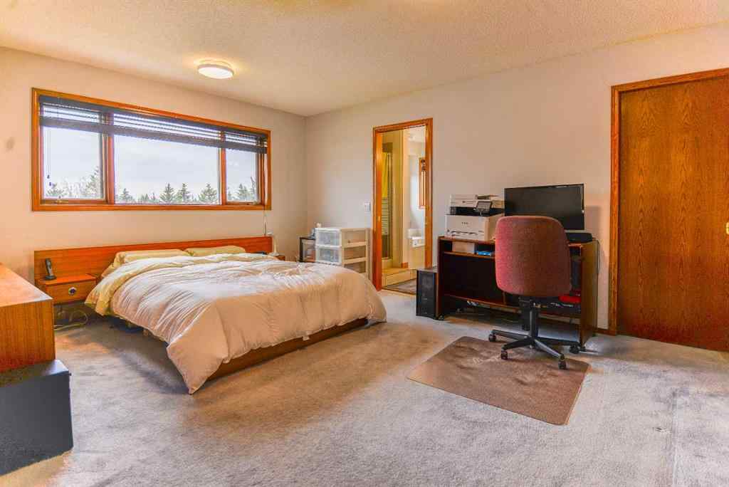 MLS® A2250966 - 393 Hawktree Circle NW in Hawkwood Calgary, Residential
