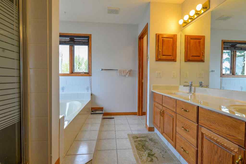 MLS® A2250966 - 393 Hawktree Circle NW in Hawkwood Calgary, Residential