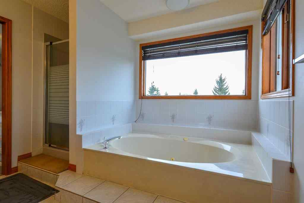 MLS® A2250966 - 393 Hawktree Circle NW in Hawkwood Calgary, Residential