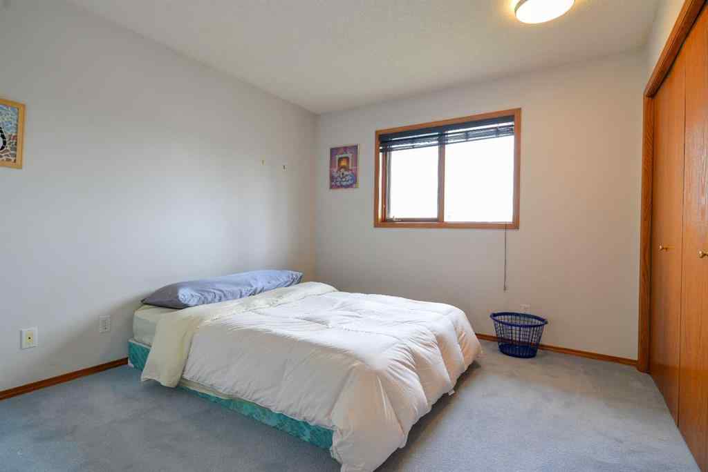MLS® A2250966 - 393 Hawktree Circle NW in Hawkwood Calgary, Residential