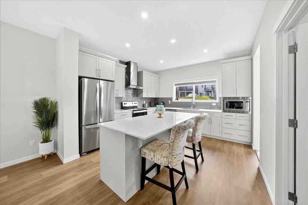 MLS® A2250972 - 10 Lucas Close NW in Livingston Calgary, Residential