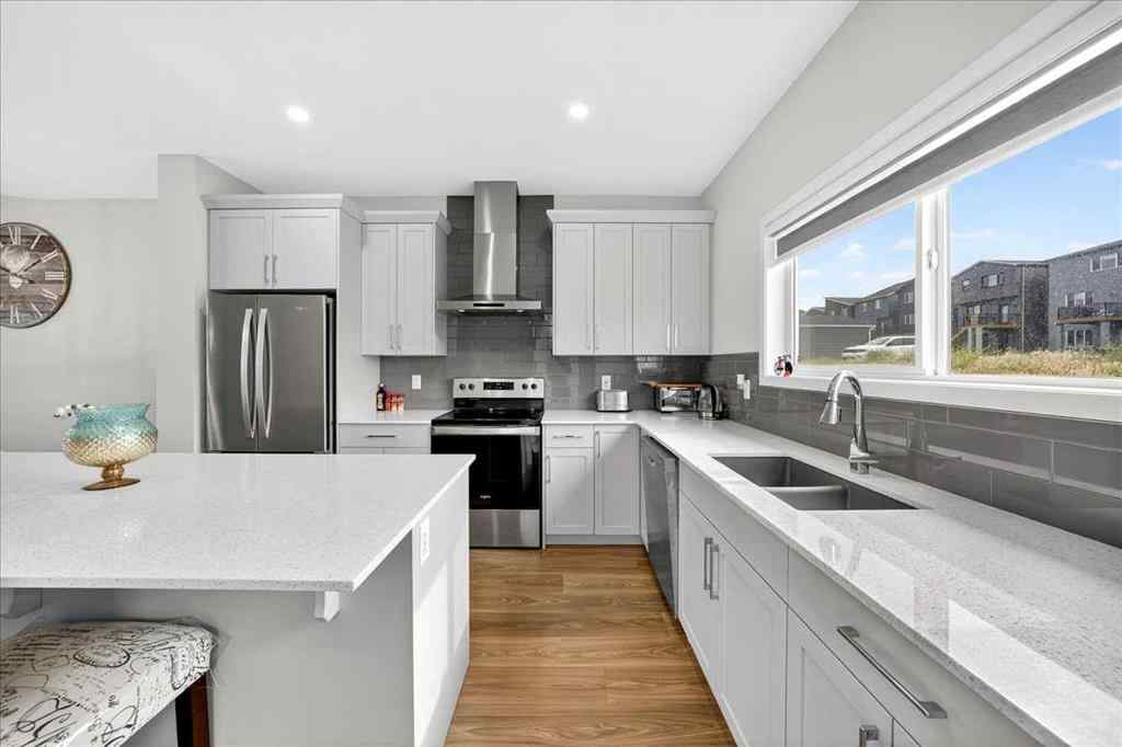 MLS® A2250972 - 10 Lucas Close NW in Livingston Calgary, Residential