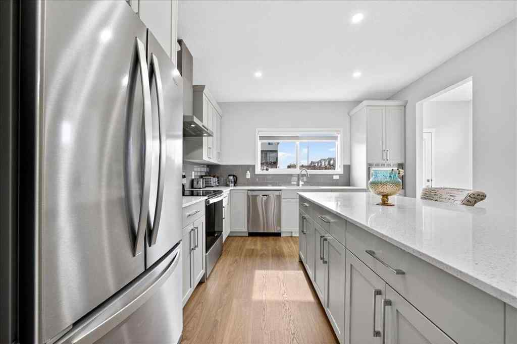 MLS® A2250972 - 10 Lucas Close NW in Livingston Calgary, Residential