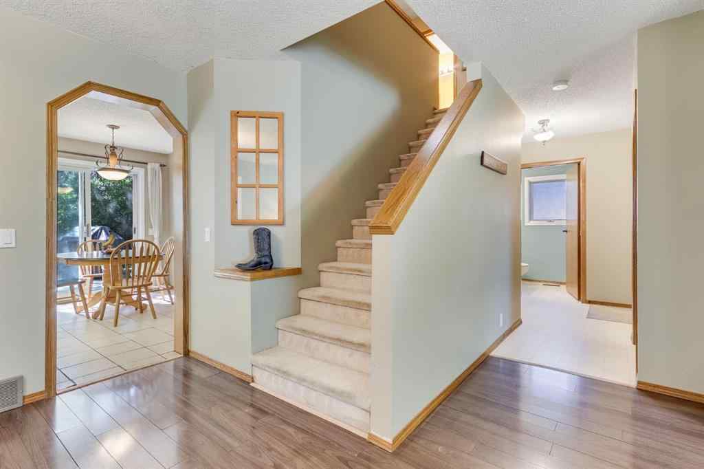 MLS® A2250998 - 212 Mckerrell Way SE in McKenzie Lake Calgary, Residential