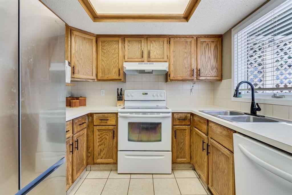 MLS® A2250998 - 212 Mckerrell Way SE in McKenzie Lake Calgary, Residential
