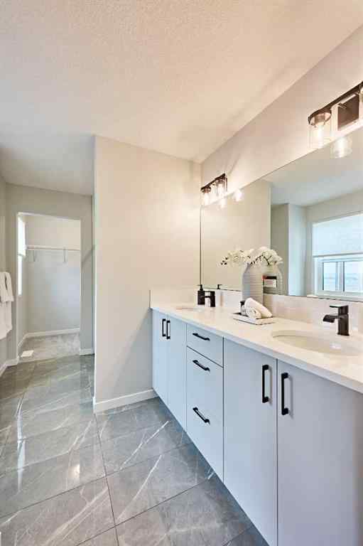 MLS® A2251000 - 148 Setonstone Manor SE in Seton Calgary, Residential