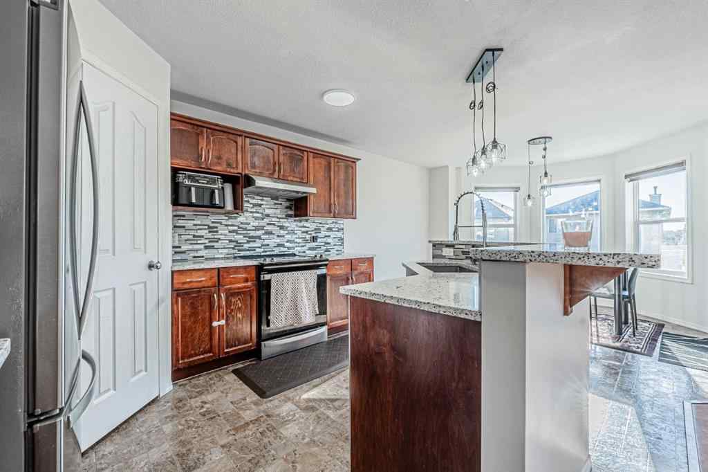 MLS® A2251004 - 57 Saddlecrest Park NE in Saddle Ridge Calgary, Residential