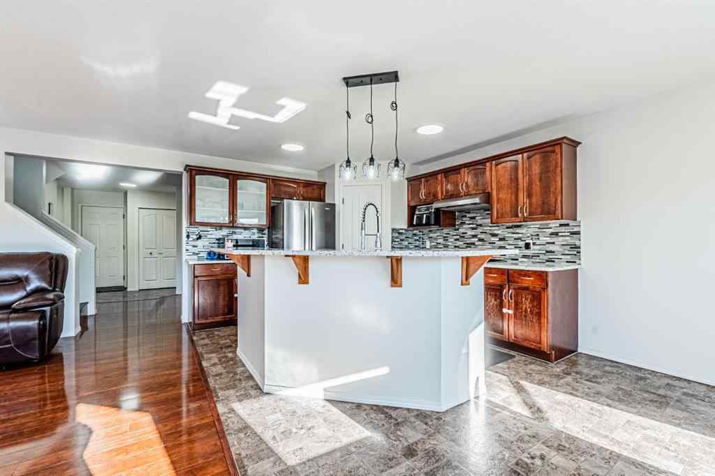 MLS® A2251004 - 57 Saddlecrest Park NE in Saddle Ridge Calgary, Residential