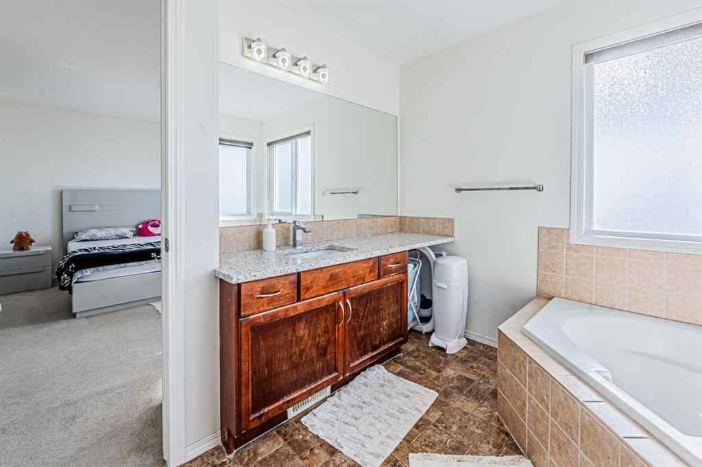 MLS® A2251004 - 57 Saddlecrest Park NE in Saddle Ridge Calgary, Residential