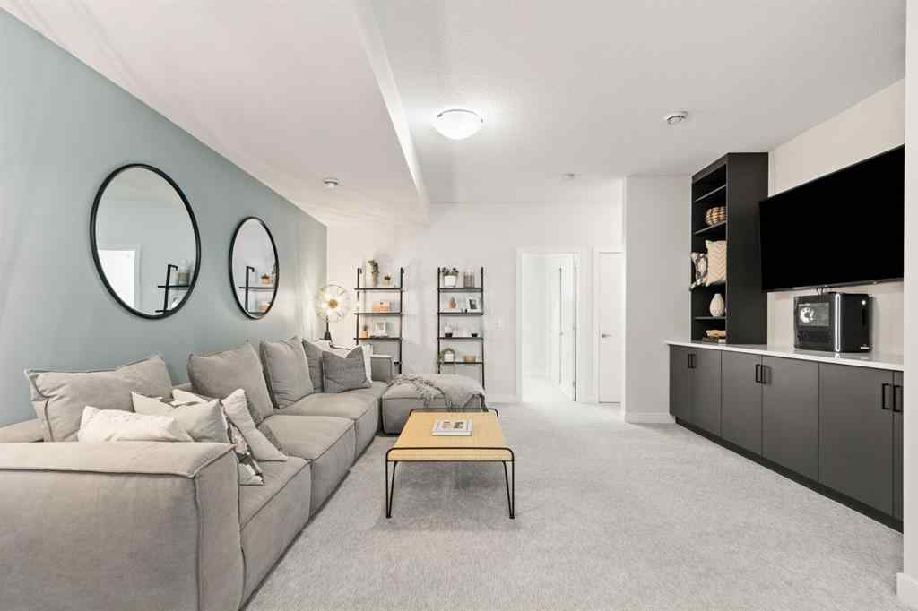 MLS® A2251042 - 1002 Harmony Parade  in Harmony Rural Rocky View County, Residential