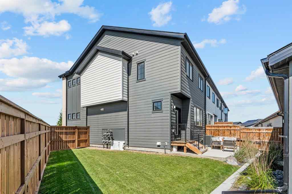 MLS® A2251042 - 1002 Harmony Parade  in Harmony Rural Rocky View County, Residential