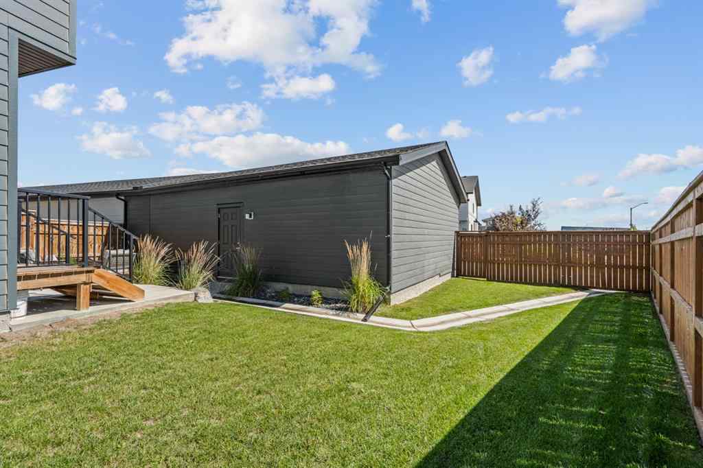 MLS® A2251042 - 1002 Harmony Parade  in Harmony Rural Rocky View County, Residential