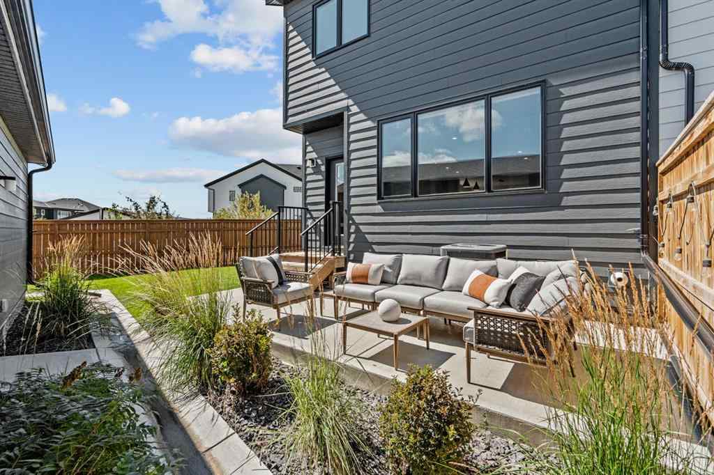 MLS® A2251042 - 1002 Harmony Parade  in Harmony Rural Rocky View County, Residential