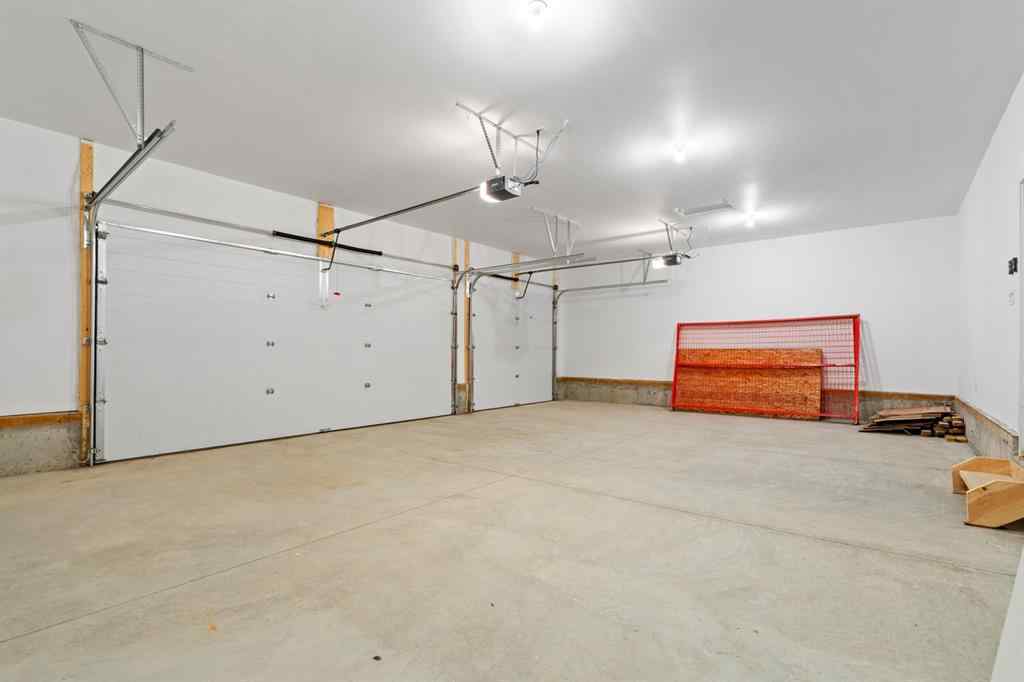 MLS® A2251042 - 1002 Harmony Parade  in Harmony Rural Rocky View County, Residential