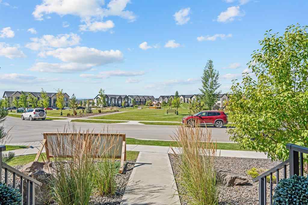 MLS® A2251042 - 1002 Harmony Parade  in Harmony Rural Rocky View County, Residential