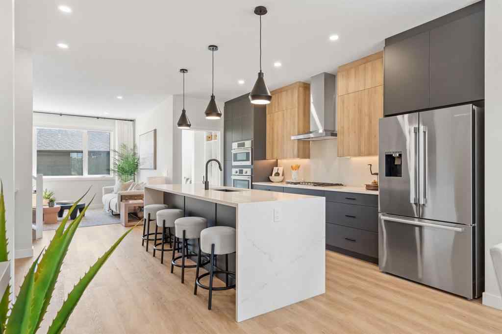 MLS® A2251042 - 1002 Harmony Parade  in Harmony Rural Rocky View County, Residential