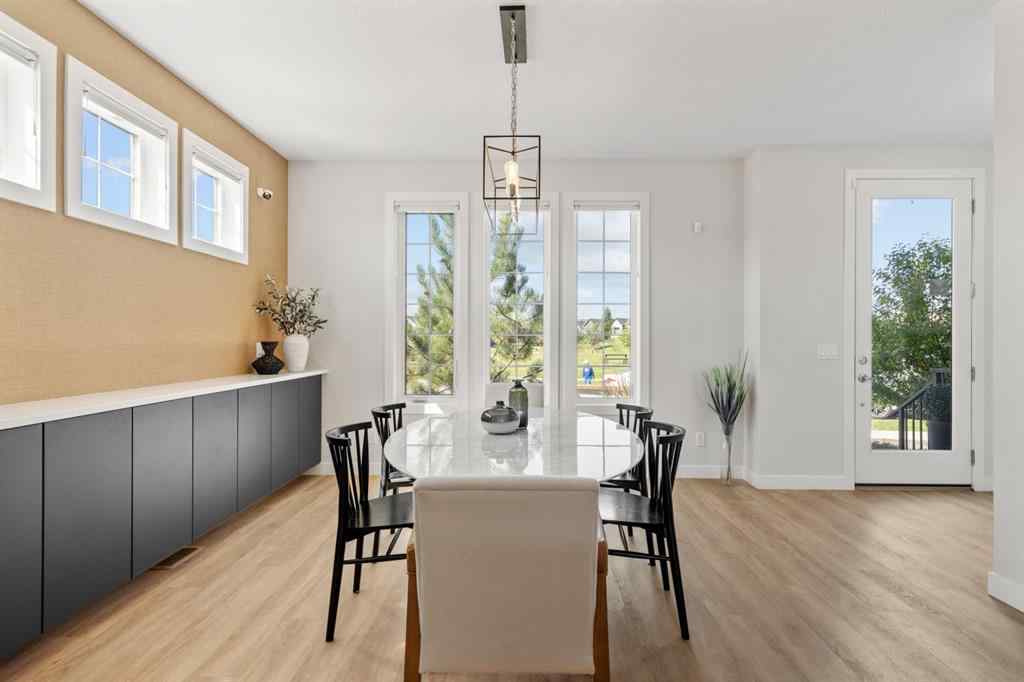 MLS® A2251042 - 1002 Harmony Parade  in Harmony Rural Rocky View County, Residential