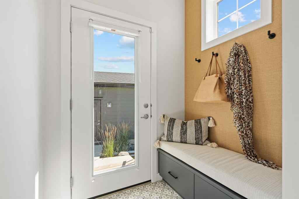 MLS® A2251042 - 1002 Harmony Parade  in Harmony Rural Rocky View County, Residential