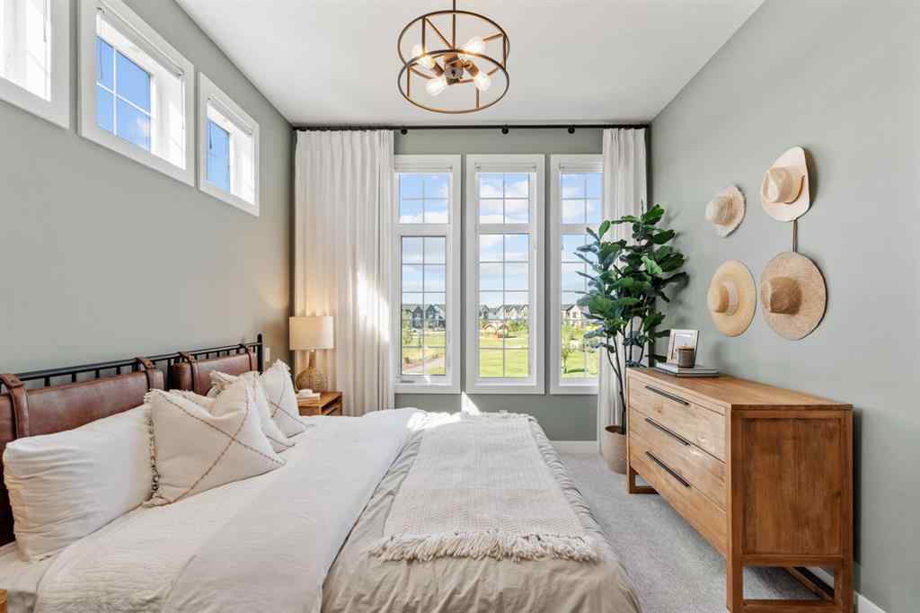 MLS® A2251042 - 1002 Harmony Parade  in Harmony Rural Rocky View County, Residential