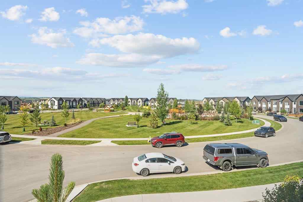 MLS® A2251042 - 1002 Harmony Parade  in Harmony Rural Rocky View County, Residential