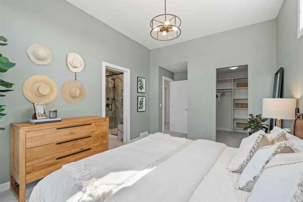 MLS® A2251042 - 1002 Harmony Parade  in Harmony Rural Rocky View County, Residential