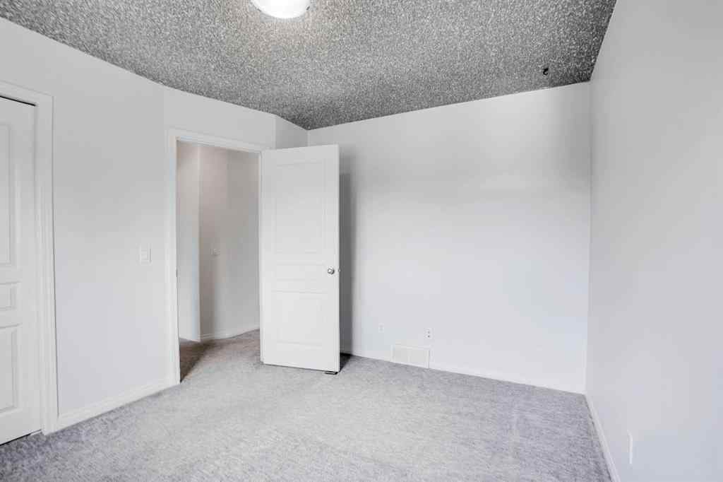 MLS® A2251067 - 210 Crimson Lane  in Rainbow Falls Chestermere, Residential
