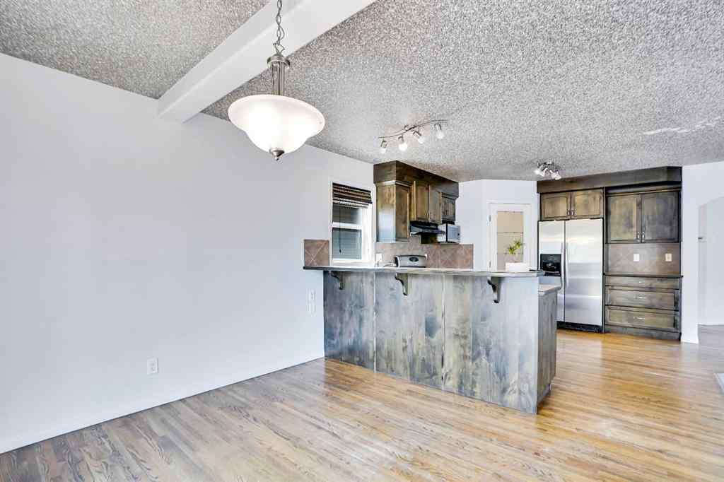 MLS® A2251067 - 210 Crimson Lane  in Rainbow Falls Chestermere, Residential