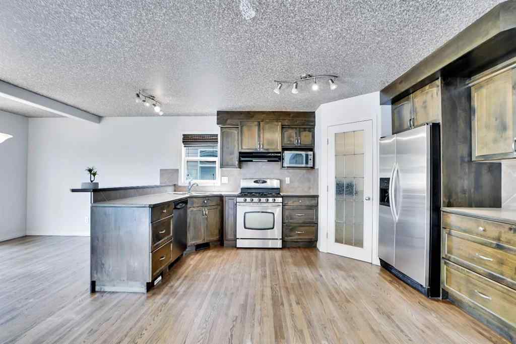 MLS® A2251067 - 210 Crimson Lane  in Rainbow Falls Chestermere, Residential