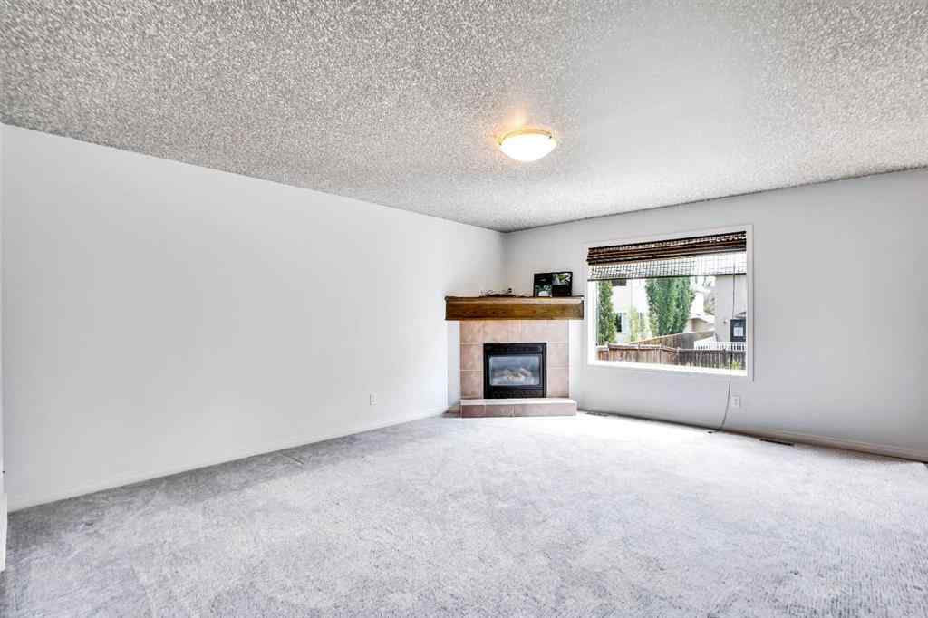MLS® A2251067 - 210 Crimson Lane  in Rainbow Falls Chestermere, Residential
