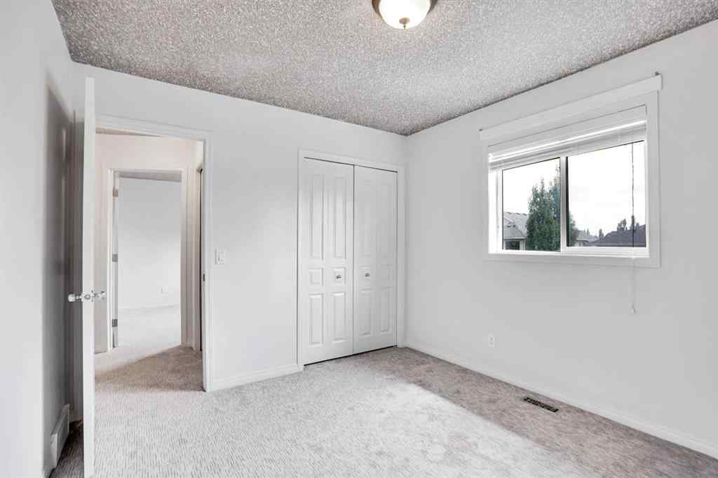 MLS® A2251067 - 210 Crimson Lane  in Rainbow Falls Chestermere, Residential