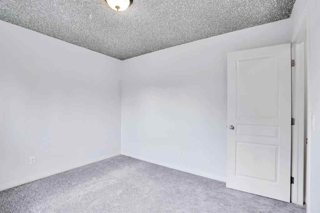 MLS® A2251067 - 210 Crimson Lane  in Rainbow Falls Chestermere, Residential