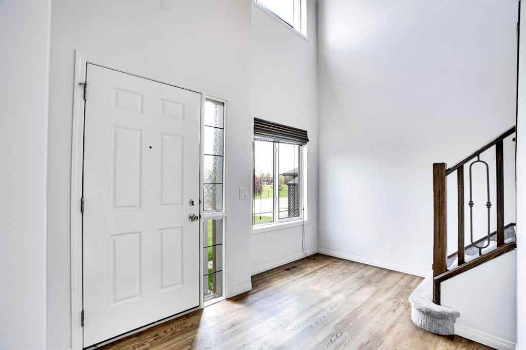 MLS® A2251067 - 210 Crimson Lane  in Rainbow Falls Chestermere, Residential