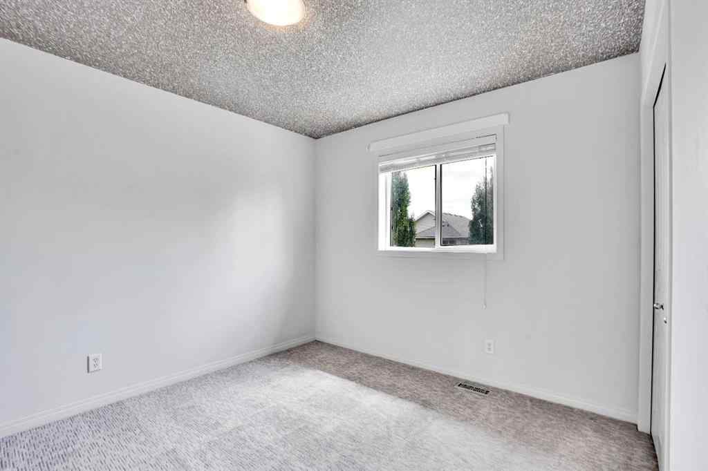 MLS® A2251067 - 210 Crimson Lane  in Rainbow Falls Chestermere, Residential