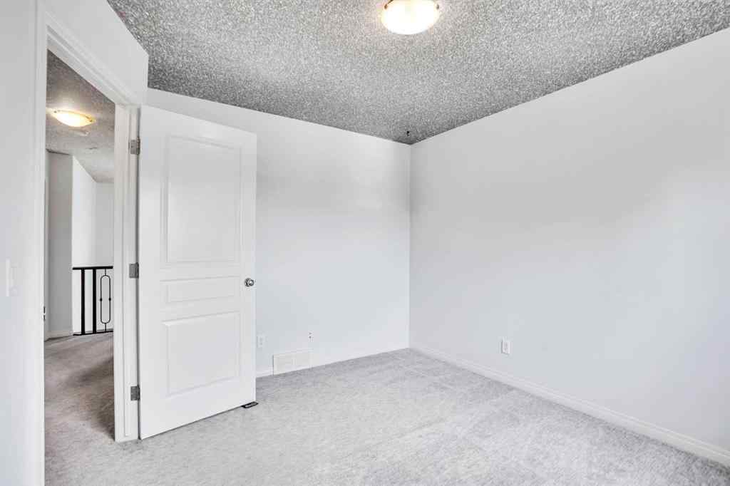 MLS® A2251067 - 210 Crimson Lane  in Rainbow Falls Chestermere, Residential