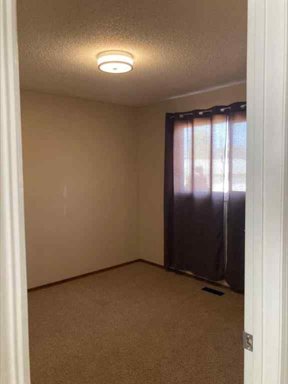 MLS® A2251071 - 16 Rossland Bay SE in Ross Glen Medicine Hat, Residential