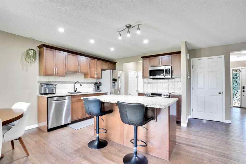 MLS® A2251077 - 174 Windstone Avenue SW in Windsong Airdrie, Residential