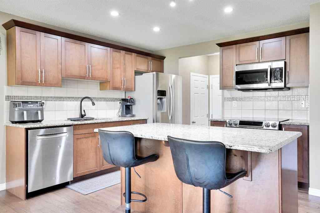 MLS® A2251077 - 174 Windstone Avenue SW in Windsong Airdrie, Residential