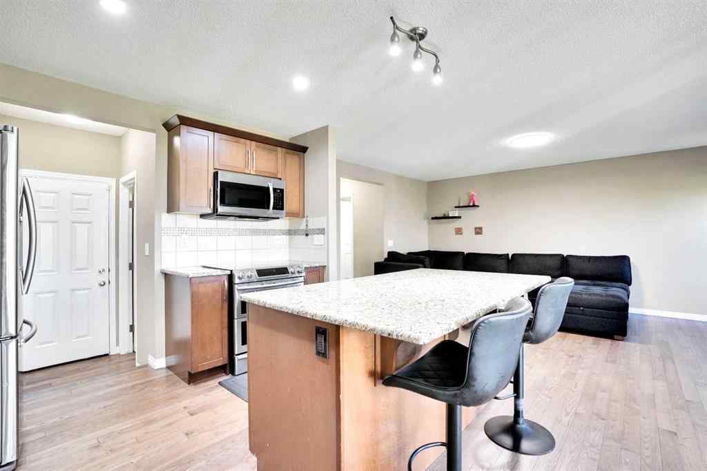 MLS® A2251077 - 174 Windstone Avenue SW in Windsong Airdrie, Residential