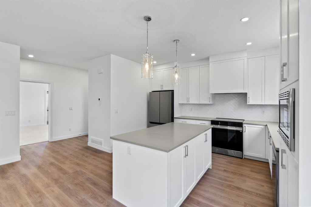 MLS® A2251094 - Unit #1102 201 Cooperswood Green SW in Coopers Crossing Airdrie, Residential