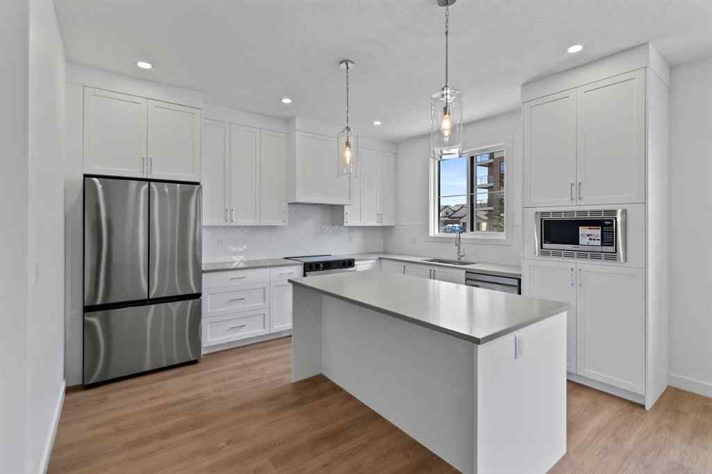 MLS® A2251094 - Unit #1102 201 Cooperswood Green SW in Coopers Crossing Airdrie, Residential