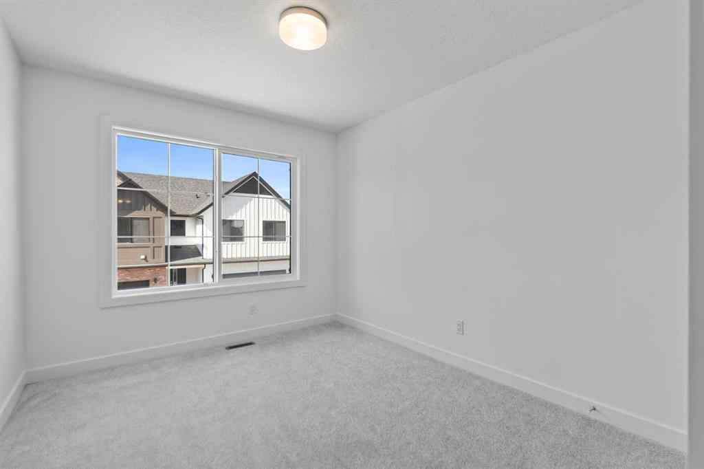 MLS® A2251094 - Unit #1102 201 Cooperswood Green SW in Coopers Crossing Airdrie, Residential