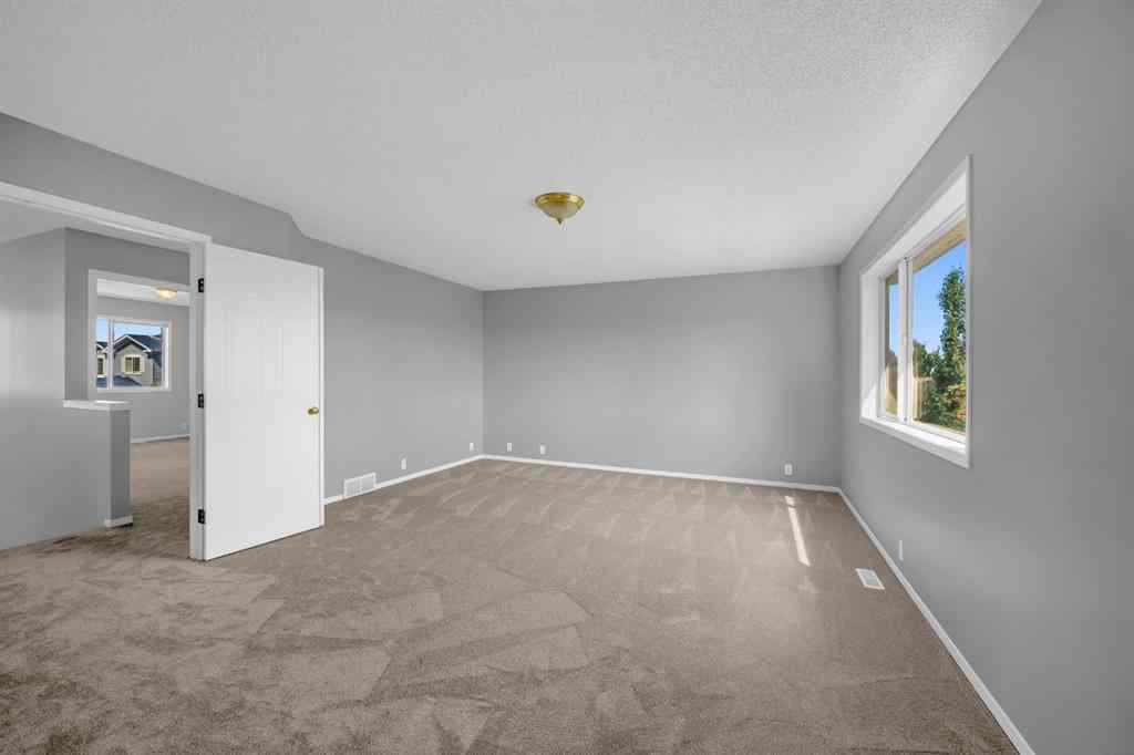 MLS® A2251104 - 518 Bridlecreek Green SW in Bridlewood Calgary, Residential