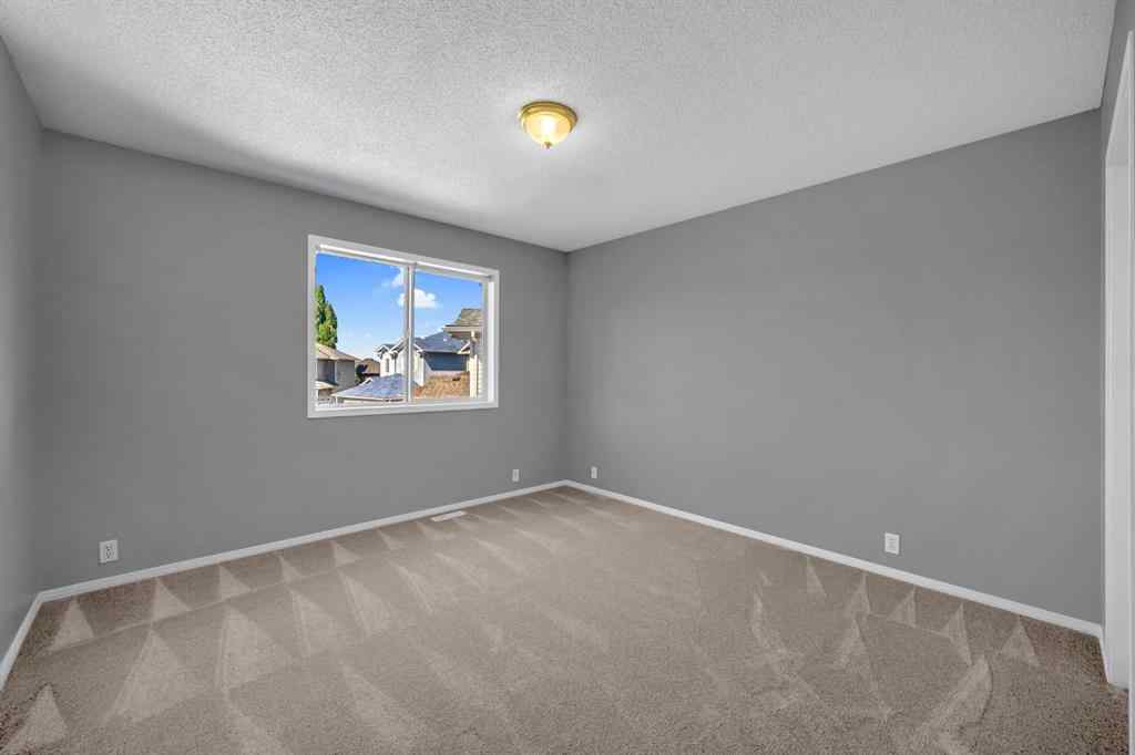 MLS® A2251104 - 518 Bridlecreek Green SW in Bridlewood Calgary, Residential