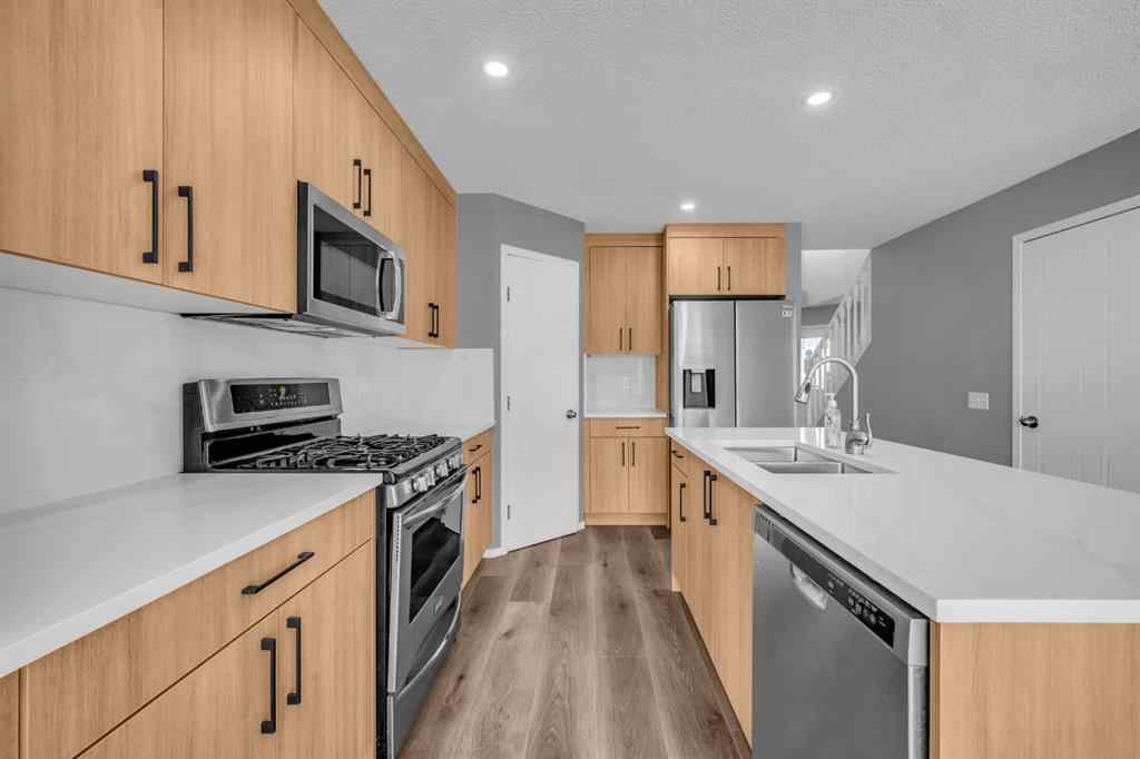 MLS® A2251104 - 518 Bridlecreek Green SW in Bridlewood Calgary, Residential