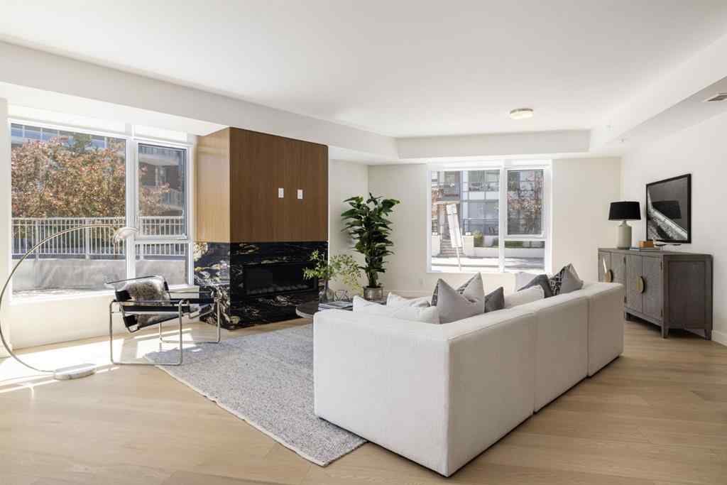 MLS® A2251109 - Unit #102 88 Waterfront Mews SW in Chinatown Calgary, Residential