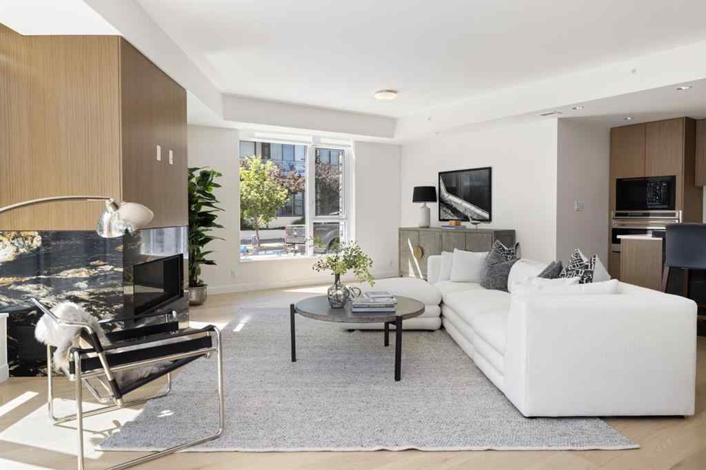 MLS® A2251109 - Unit #102 88 Waterfront Mews SW in Chinatown Calgary, Residential