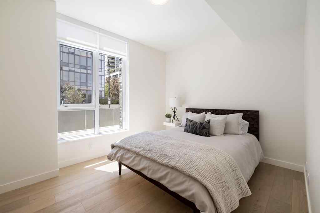 MLS® A2251109 - Unit #102 88 Waterfront Mews SW in Chinatown Calgary, Residential