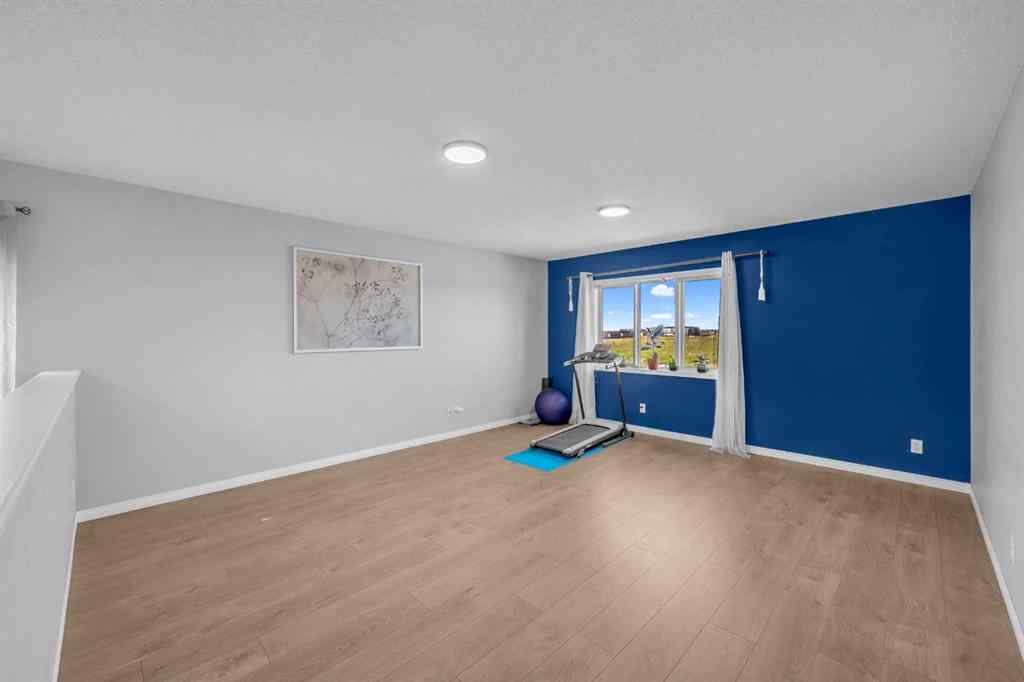 MLS® A2251126 - 233 Saddlecrest Way NE in Saddle Ridge Calgary, Residential