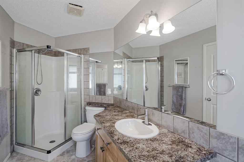 MLS® A2251140 - 186 Everstone Drive SW in Evergreen Calgary, Residential