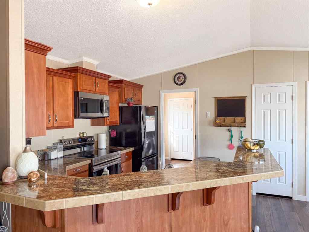 MLS® A2251146 - 5219 44th Street  in NONE Clive, Residential